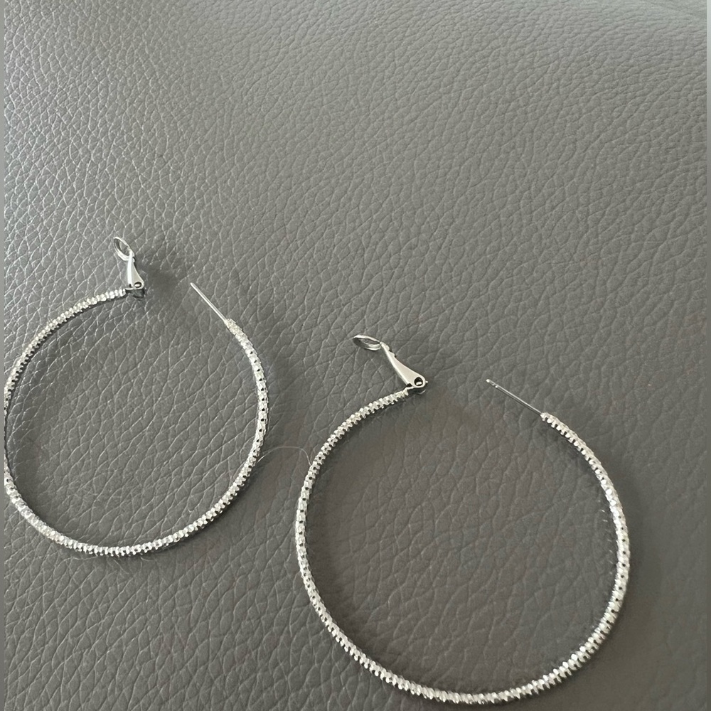 Pretty big round silver hoop earrings